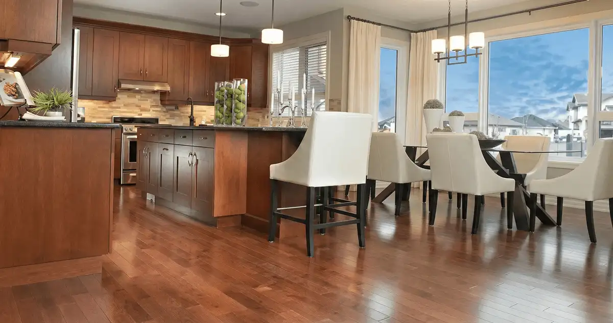 A modern kitchen with professionally installed wood flooring in Boise, ID